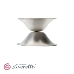 Silverette® Nursing Cups in silver, designed for breastfeeding comfort, shown on a white background with four cups arranged neatly.